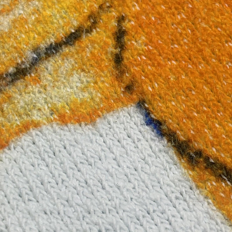 Close-up detail shot of Louis Vuitton luxury clothing with everyday silhouette