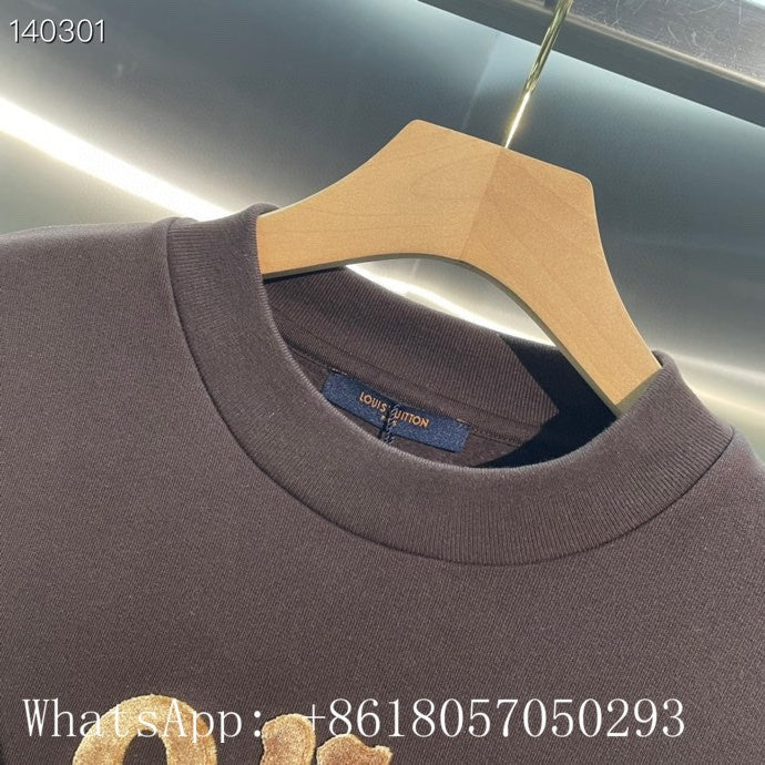 Flat lay presentation of Louis Vuitton luxury clothing with runway-inspired design