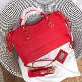 Top view of polished statement women's handbag – women's designer-style accessory