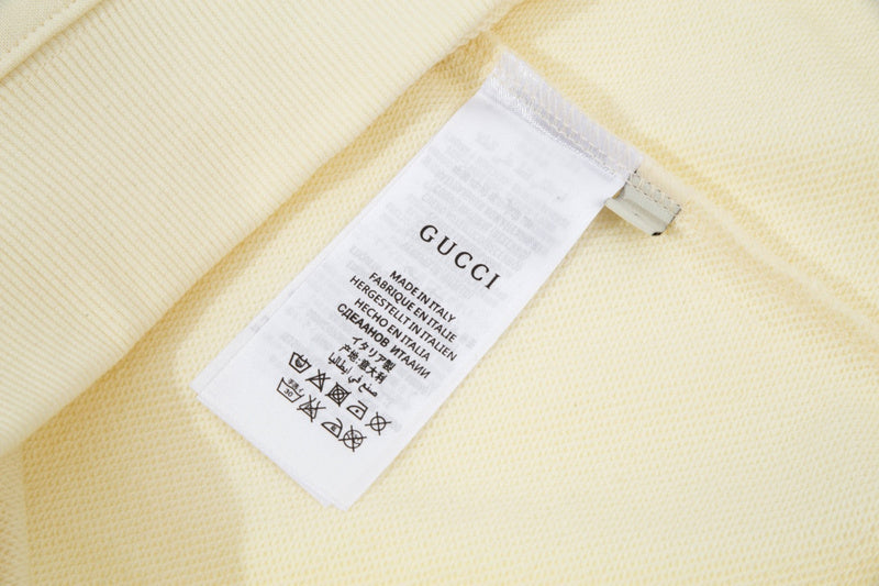Close-up detail shot of Gucci luxury clothing with everyday silhouette