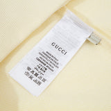 Close-up detail shot of Gucci luxury clothing with everyday silhouette