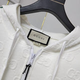 Side profile of Gucci luxury clothing with label-forward styling