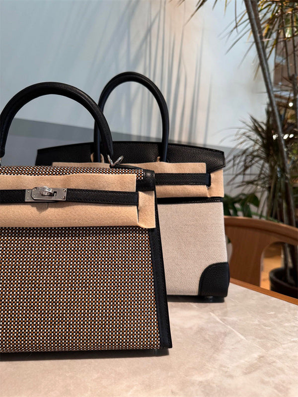 Side view of refined structured handbag