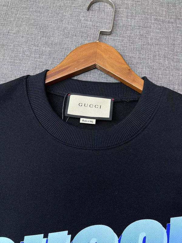 Front view of Gucci luxury clothing with signature branding