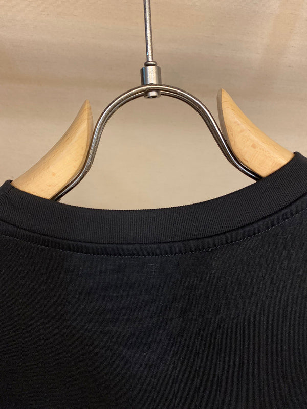 Side profile view of Balmain luxury piece style No.031