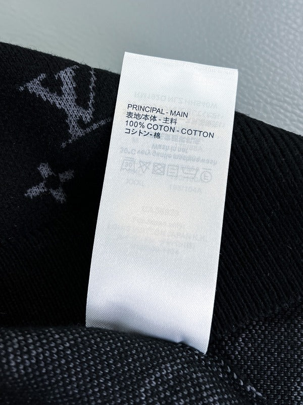 Side profile of Louis Vuitton luxury clothing with monogram-inspired silhouette