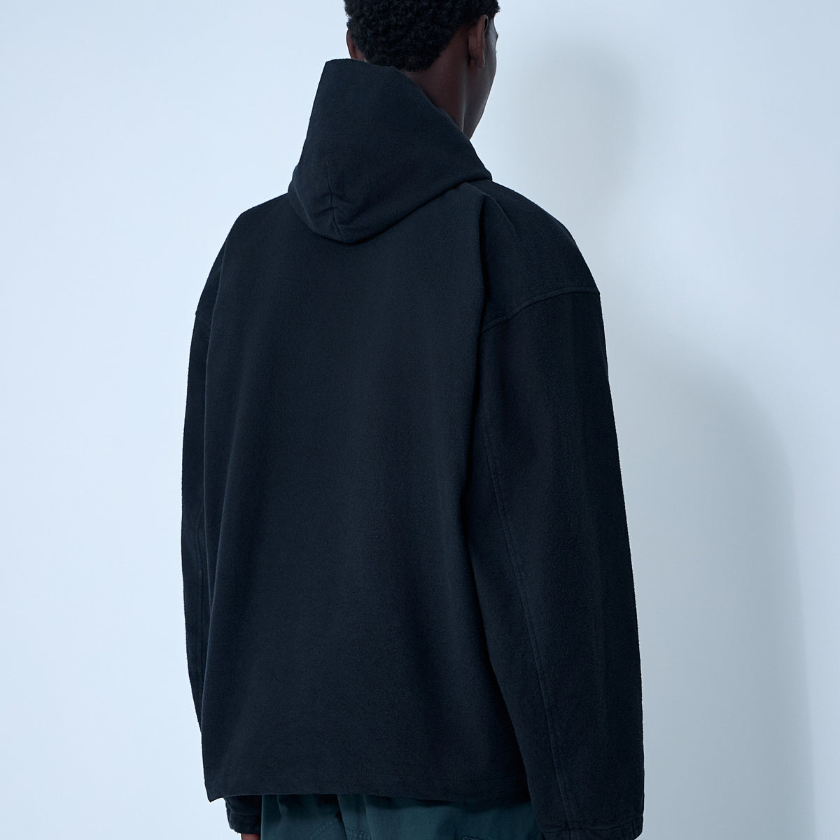 Close-up of Balenciaga jackets hardware and fine stitching