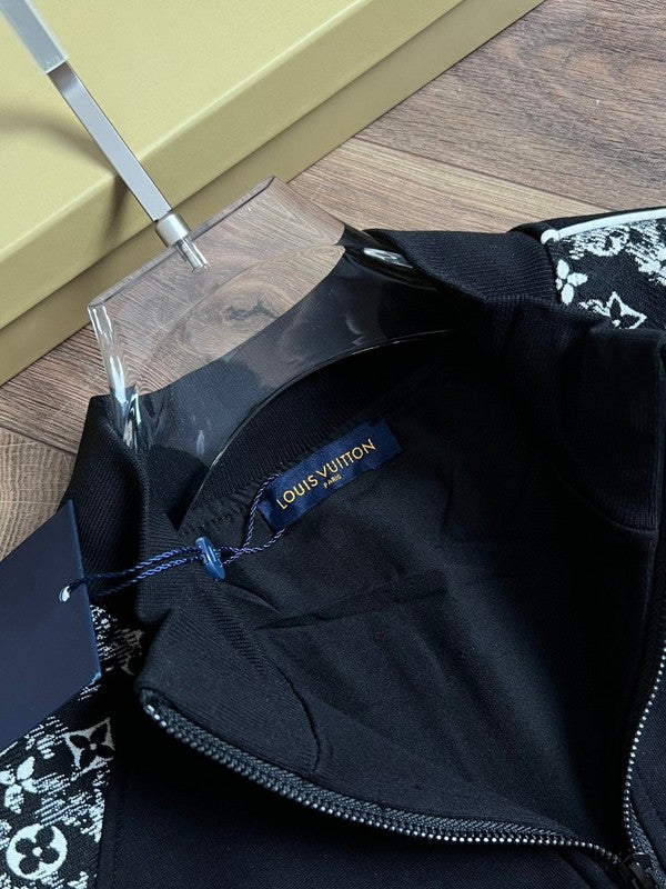 Full styled look of Louis Vuitton luxury clothing with label-forward styling