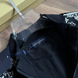 Full styled look of Louis Vuitton luxury clothing with label-forward styling