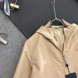 Side profile of Louis Vuitton luxury clothing with tailored silhouette