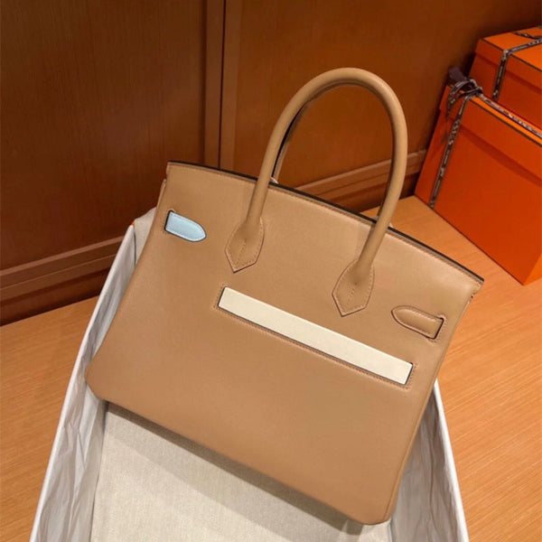 Side view of balanced structured handbag