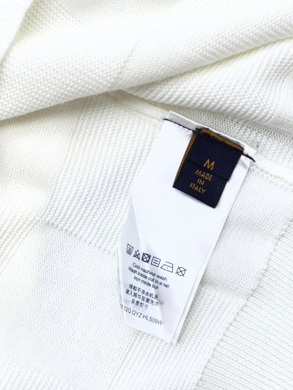 Side profile of Louis Vuitton luxury clothing with signature branding