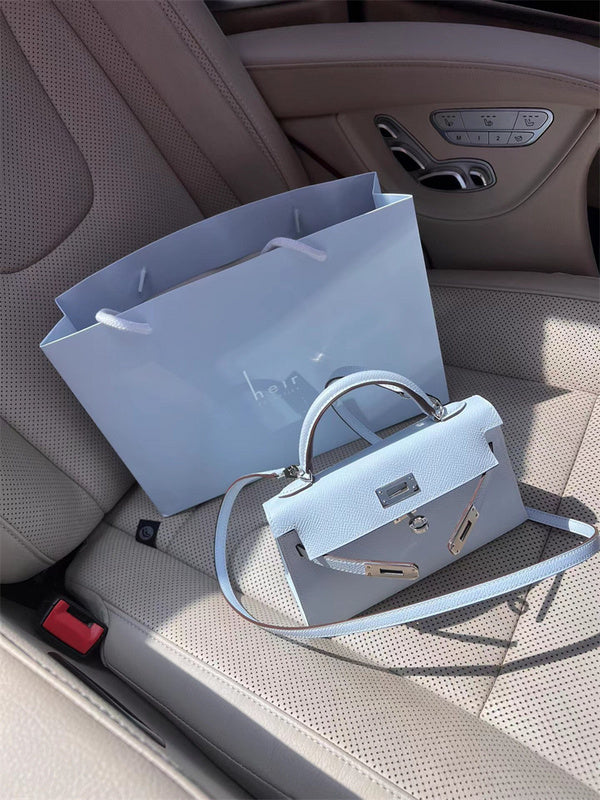 Side view of minimalist structured handbag