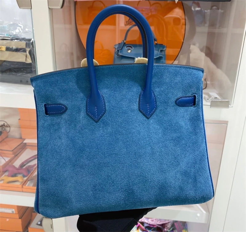  clean-lined shoulder bag detail view showing craftsmanship 8