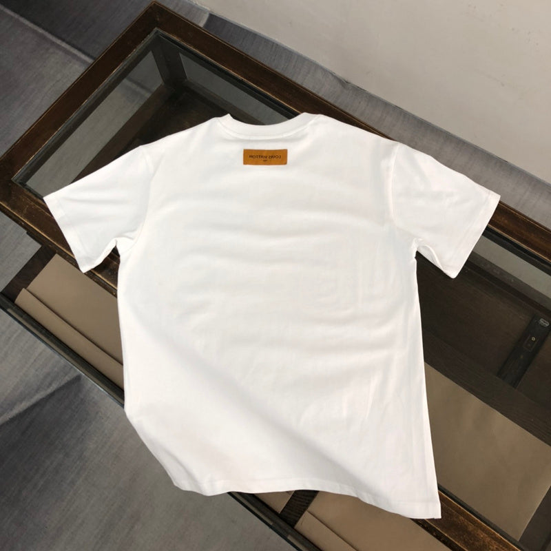 Close-up detail shot of Louis Vuitton cotton t-shirt with runway-inspired design