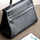 Sophisticated bag shown from front angle