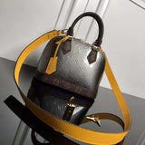 Side profile of statement classic women's handbag – women's luxury accessory