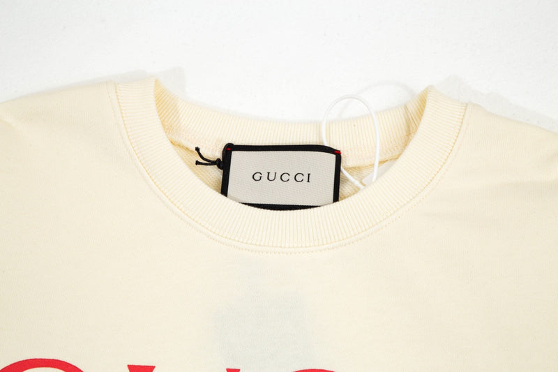 Close-up detail shot of Gucci luxury clothing with contemporary cut