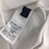 Side profile of Louis Vuitton luxury clothing with signature branding