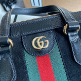 Back view of premium signature women's handbag – women's designer-style accessory