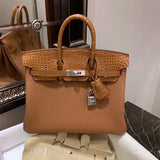  Sleek top-handle bag carried on shoulder 10