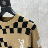 Full styled look of Louis Vuitton luxury clothing with logo-detail design