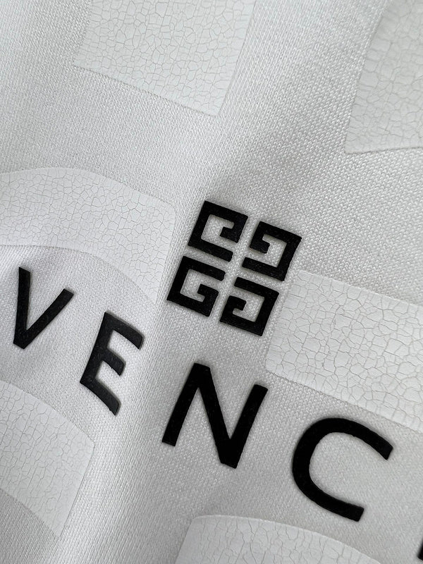 Flat lay presentation of Givenchy luxury clothing with everyday silhouette