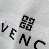 Flat lay presentation of Givenchy luxury clothing with everyday silhouette