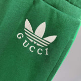 Side profile of Gucci luxury clothing with logo-detail design