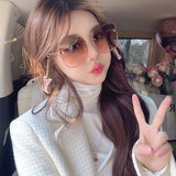 Angled view of Louis Vuitton unisex sunglasses