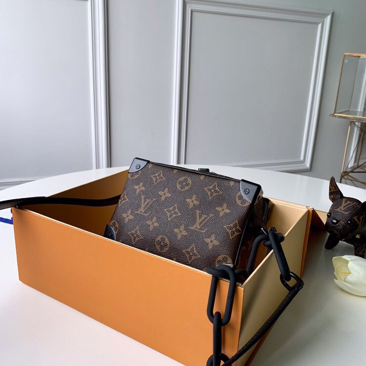 Side profile of refined signature women's handbag – women's statement bag