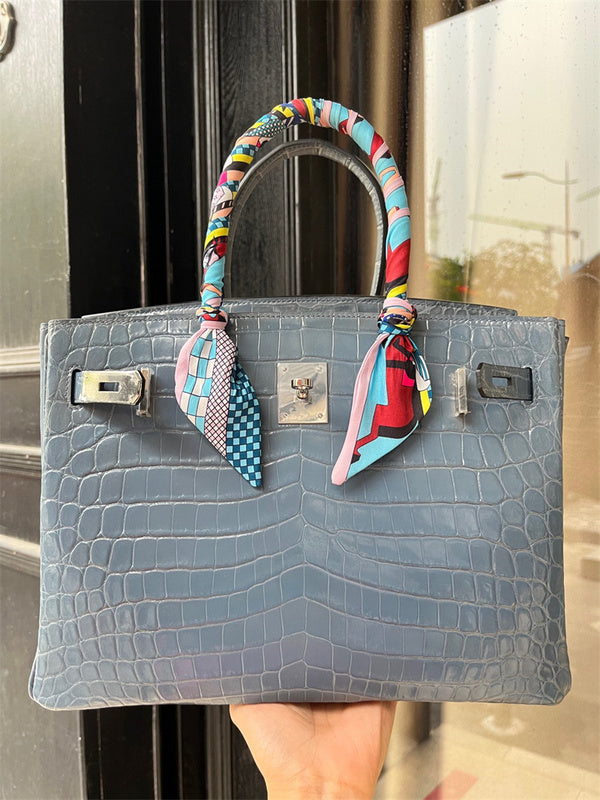  Tailored structured bag carried on shoulder 10