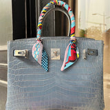  Tailored structured bag carried on shoulder 10