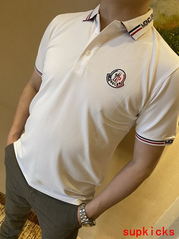 Front view of Moncler luxury clothing with tailored silhouette