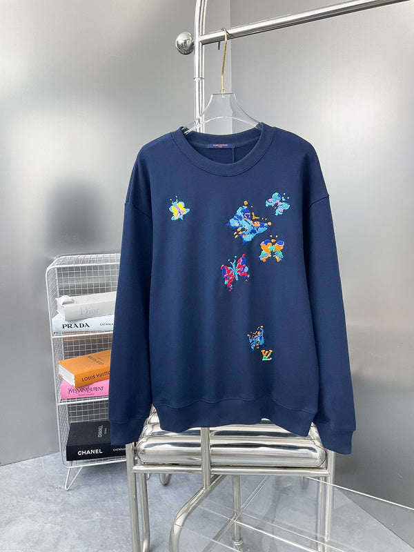 Back view of Louis Vuitton luxury clothing with label-forward styling