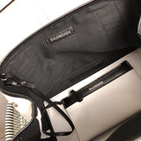 Side profile of everyday-luxe statement women's handbag – women's luxury accessory