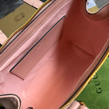 Close-up detail of premium signature women's handbag – women's designer-style accessory