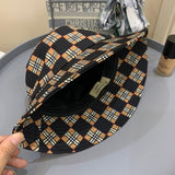Side view of Burberry unisex cap