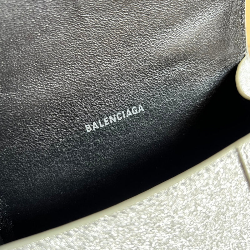 Close-up detail of polished statement women's handbag – women's premium purse