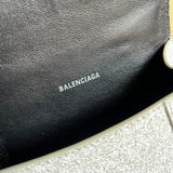 Close-up detail of polished statement women's handbag – women's premium purse