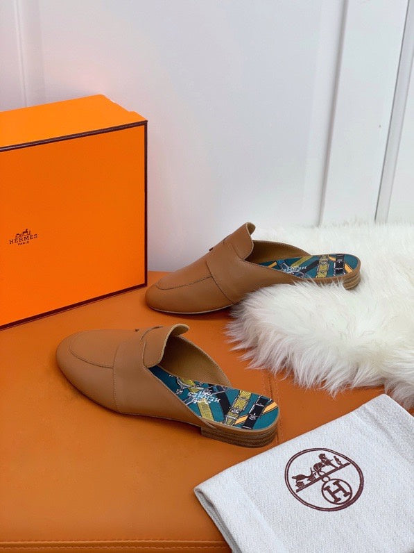 Hermès Black Loafer Flats - Lifestyle Styling Shot