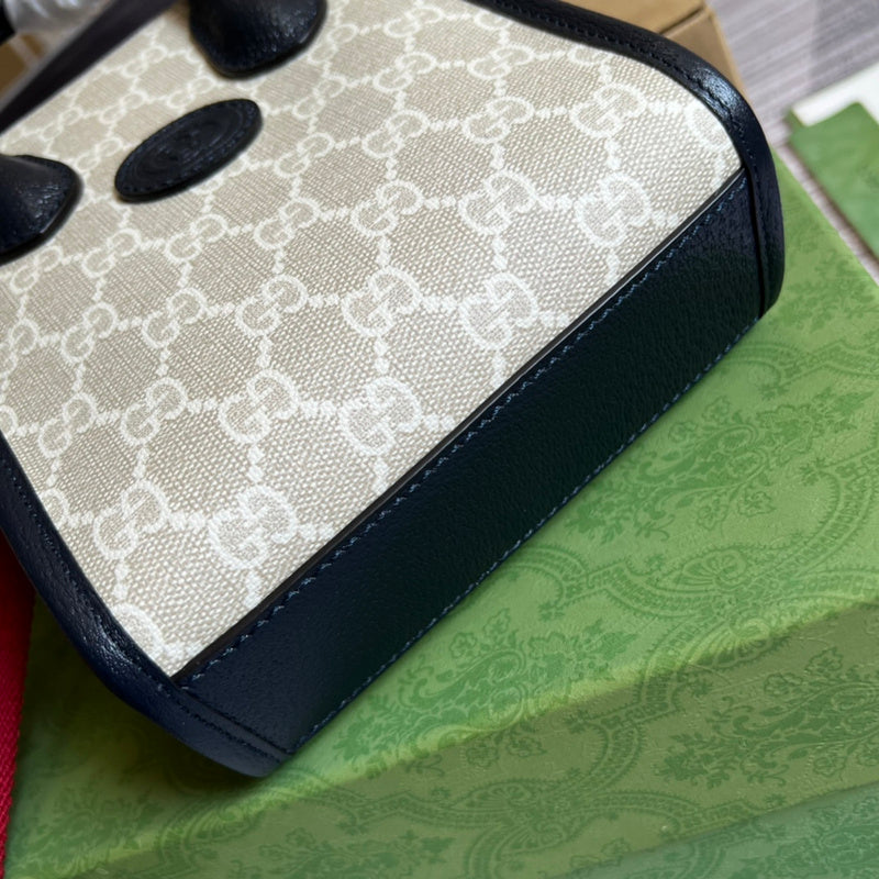 Styled lifestyle shot of sleek signature women's handbag – women's luxury handbag