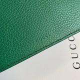 Styled lifestyle shot of sleek signature women's handbag – women's premium purse