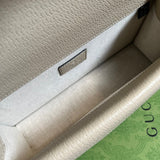 Close-up detail of polished classic women's handbag – women's designer-style accessory