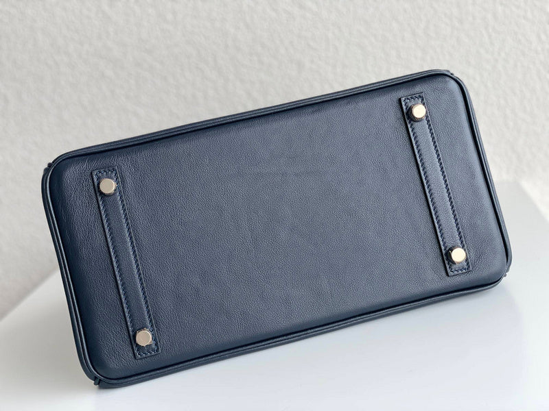 Side view of timeless structured handbag