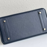 Side view of timeless structured handbag