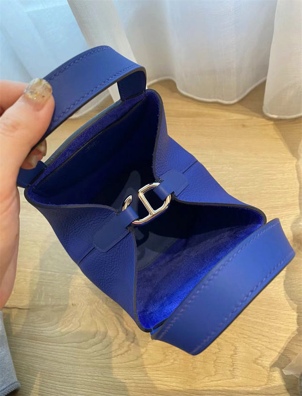 Side view of poised structured handbag