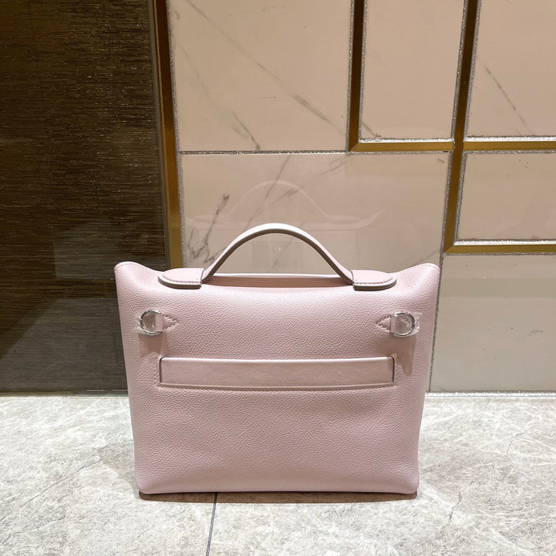 Side view of poised structured handbag