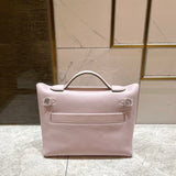 Side view of poised structured handbag