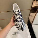 Alexander McQueen muted earth tones luxury sneakers view 8 low-top design